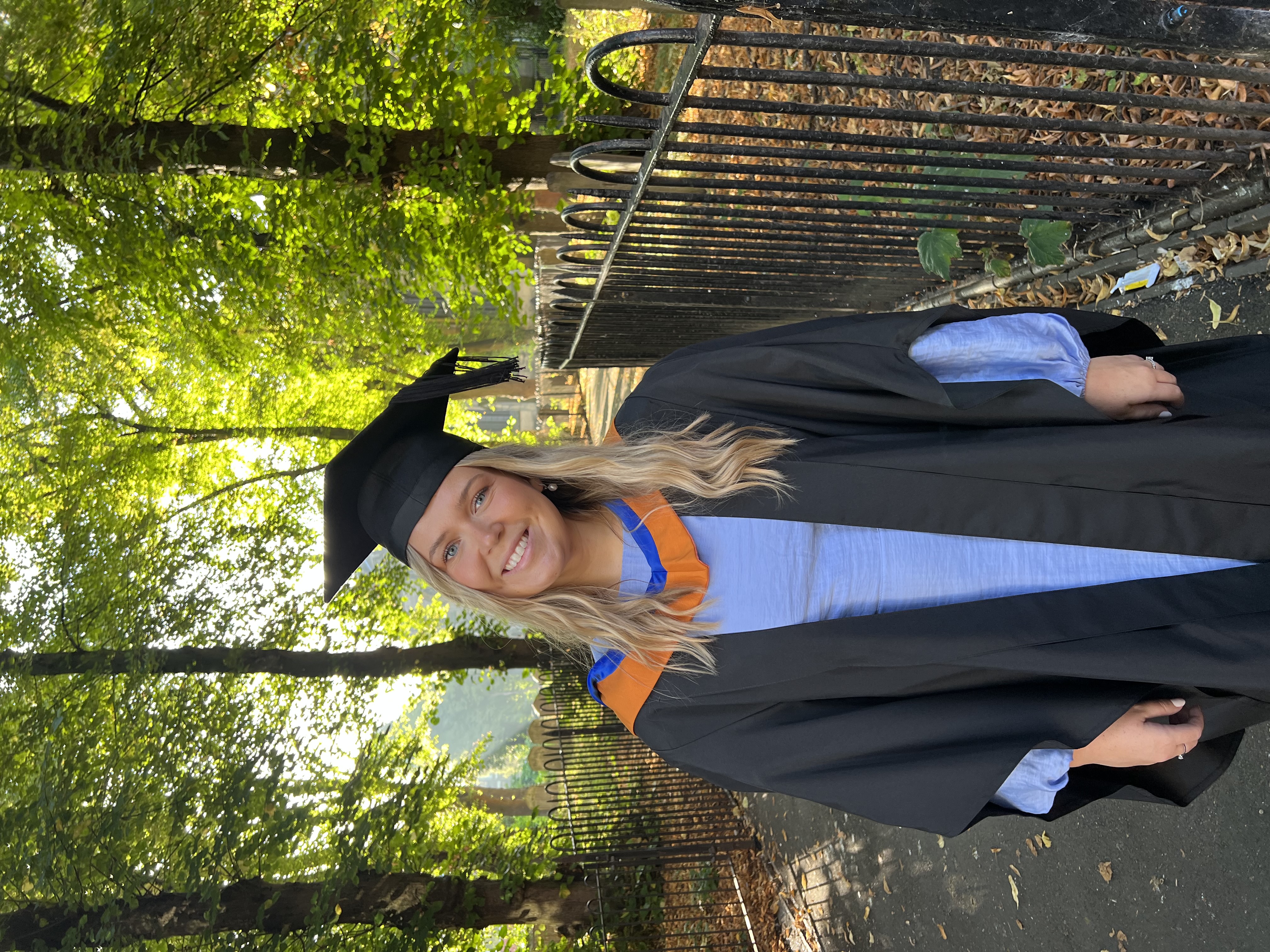 Woman in graduation cap and gown