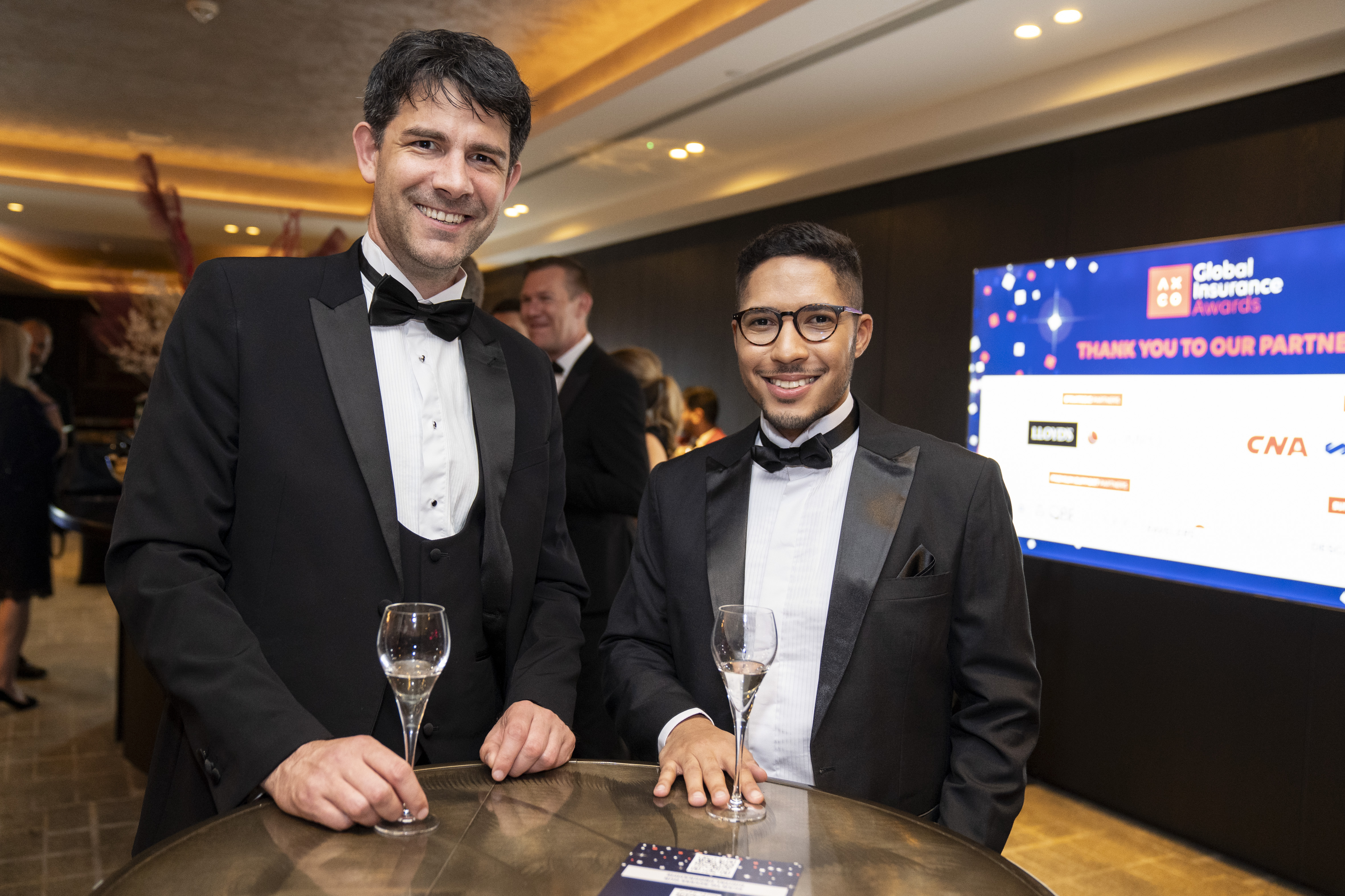 Two men in black tie dinner jackets