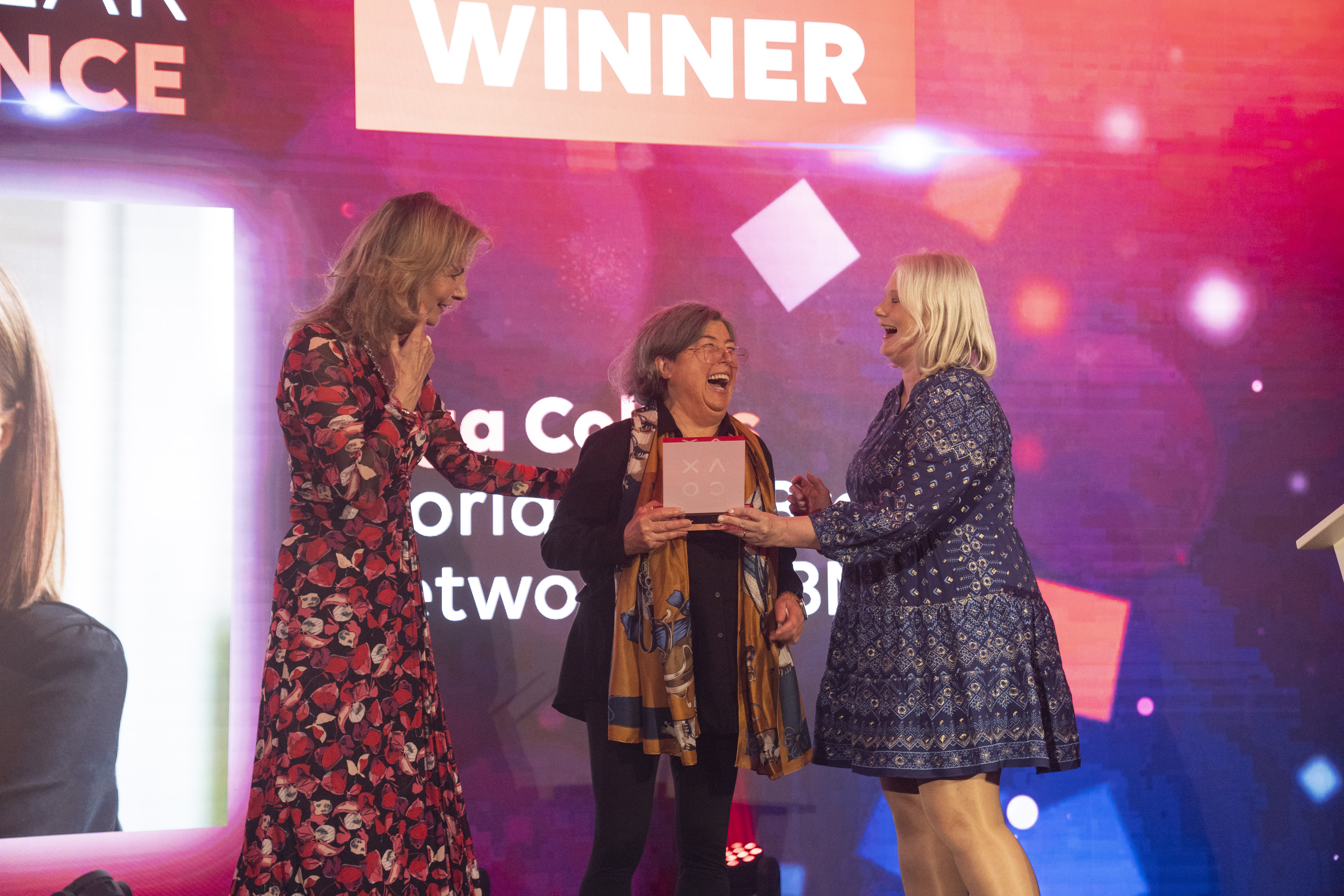 Winner receiving an award on stage