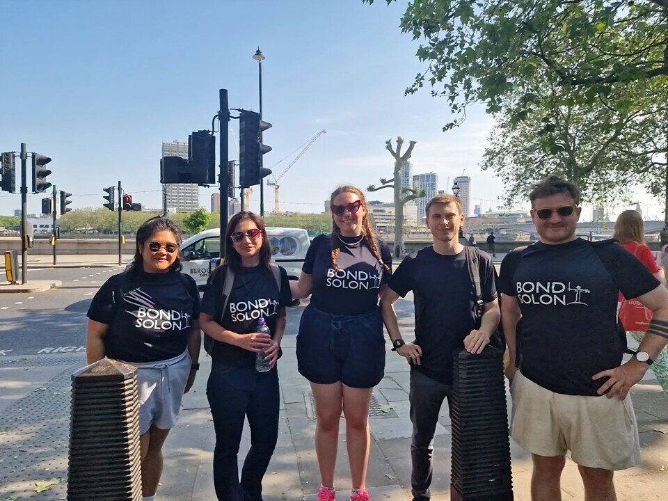 Bond Solon team stood in street