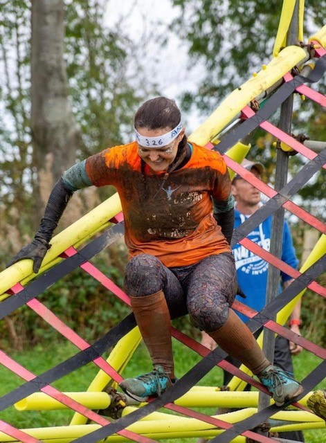 Woman on a climbing frame